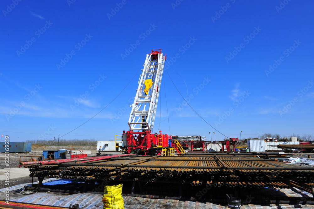 Oil field oil workers at work