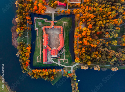 Aerial photo Nesvizh castle in autumn evening, Belarus Minsk