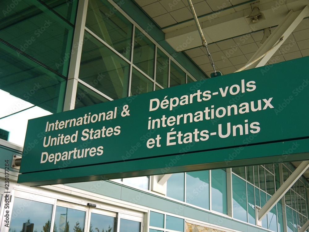 sign showing deparures of international flights at the airport