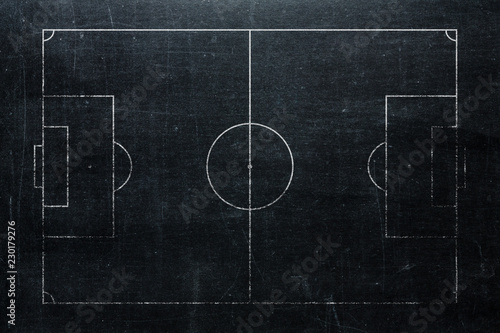 Naklejka Football or soccer field isolated on blackboard texture with chalk rubbed background from top view. Sport infographics element