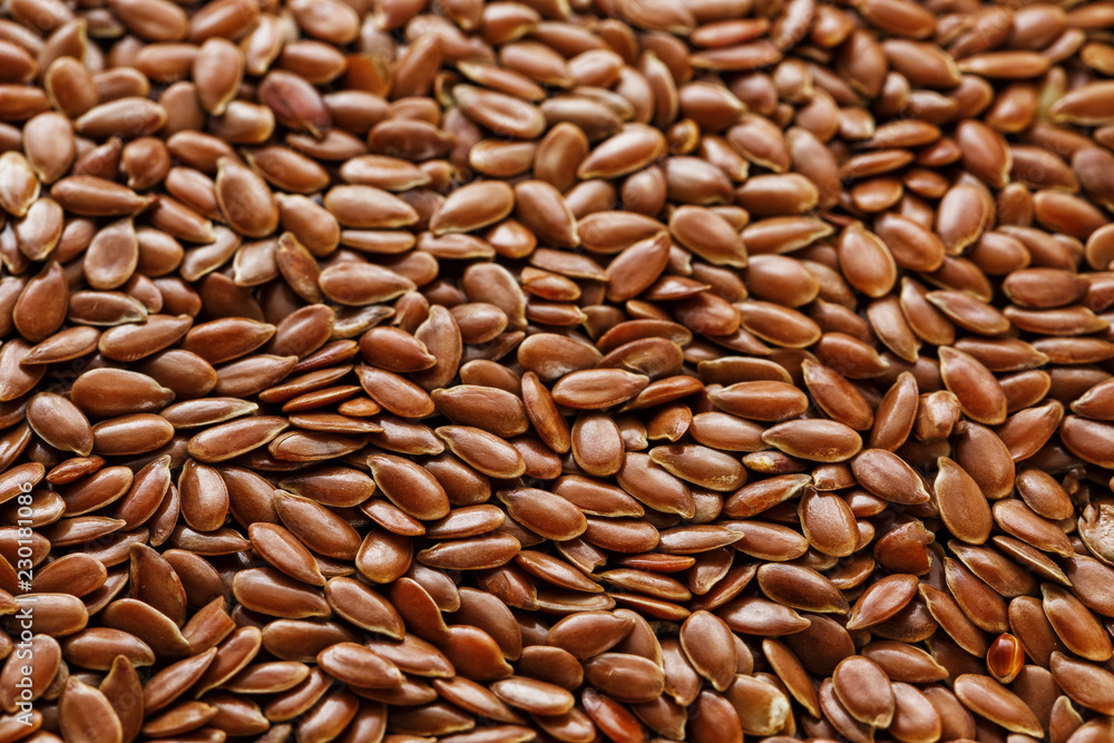 Background texture of seeds of dark brown flax. Background texture of seeds of dark brown flax.