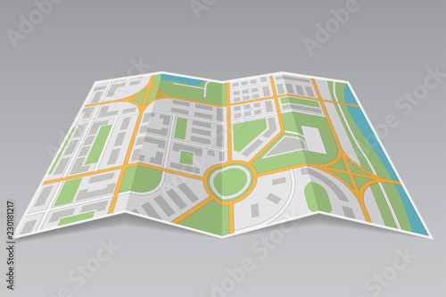 Abstract city map. Paper partially folded on gray background