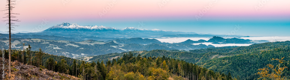 wide panorama of Tatra Mountains in autumn morning, Poland
