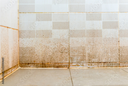 Dirty on ceramic wall in bathroom