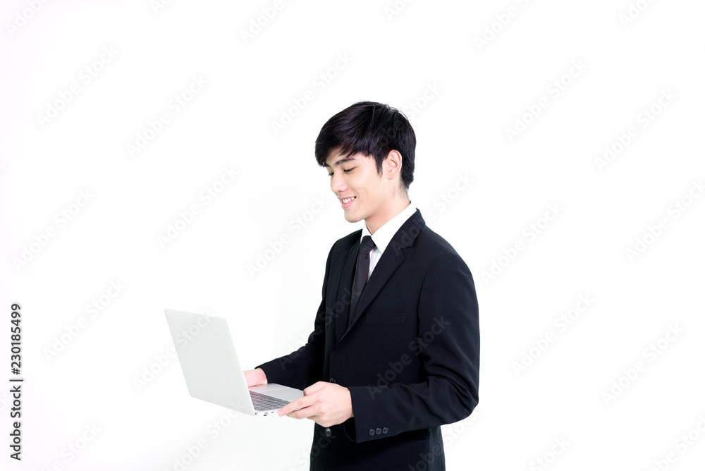 Asian business handsome man has holding laptop for woking with happy and relaxing isolated on white background.