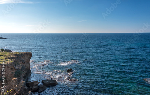 Cliffs, Sun and Turquoise Blue Water on the Southern Italian Mediterranean Coast