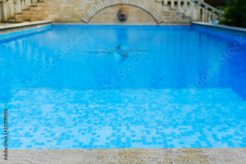 surface of blue swimming pool,background of water in swimming pool.