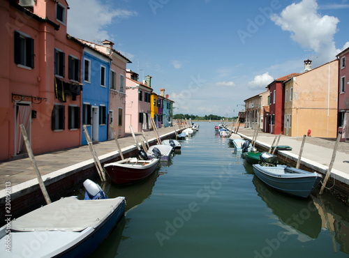 Colorful houses and boats on Burano Island