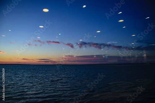 colorful dramatic sunrise in the sea. view from ferry