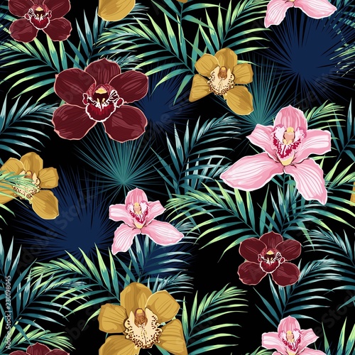 Seamless pattern, pink burgundy yellow orchid flower and green blue exotic palm leaves on black background.