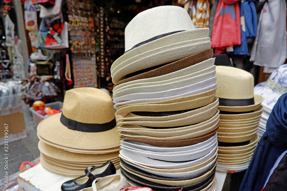 Panama hats for sale in a market stall store