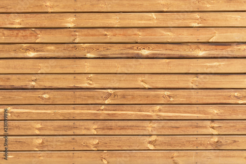 Wooden background, light texture of a wooden shield or panel