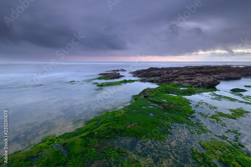 Amazing sea landscape at sunset. Seascape on beach of coast of portugal. outdoor colorful natural landscape with clouds in the sky.Cascais, Lisbon. © aroxopt