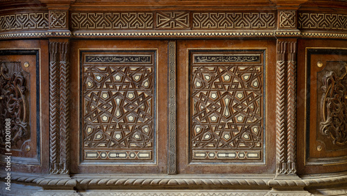 Two arabesque sashes of an old mamluk era cupboard with geometrical decorations, Zeinab Khatoon historic house, Cairo, Egypt