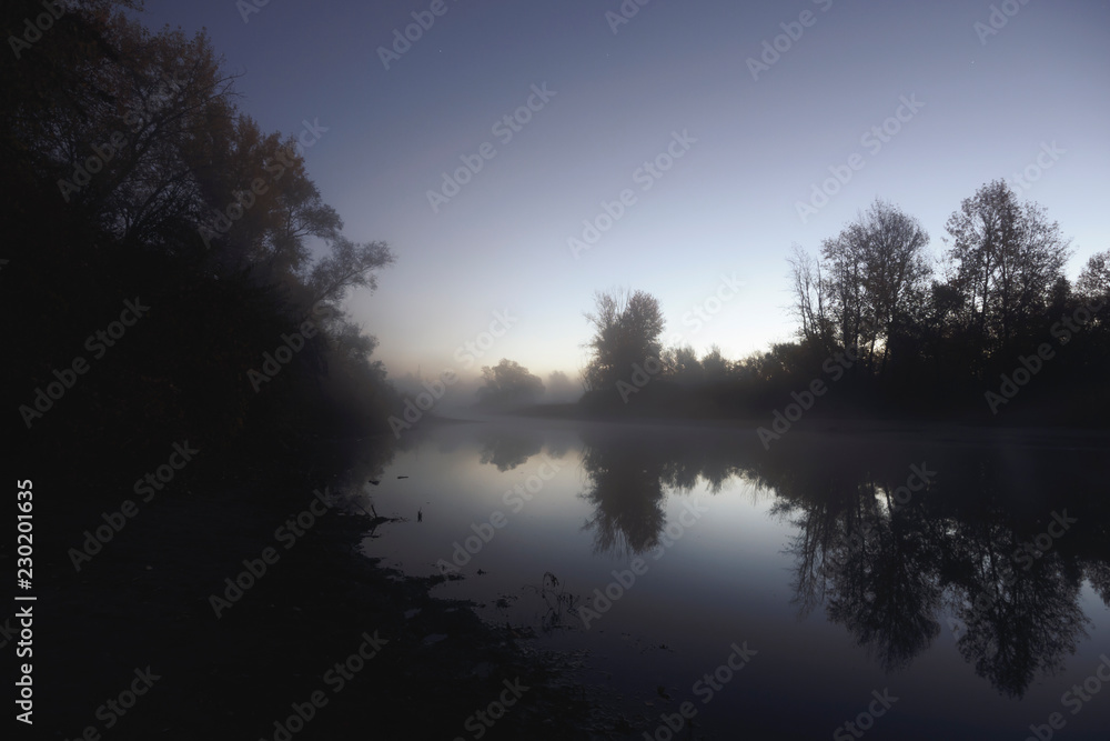 Fototapeta premium Water spills in the fog.