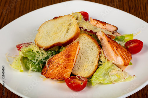 Caesar salad with salmon