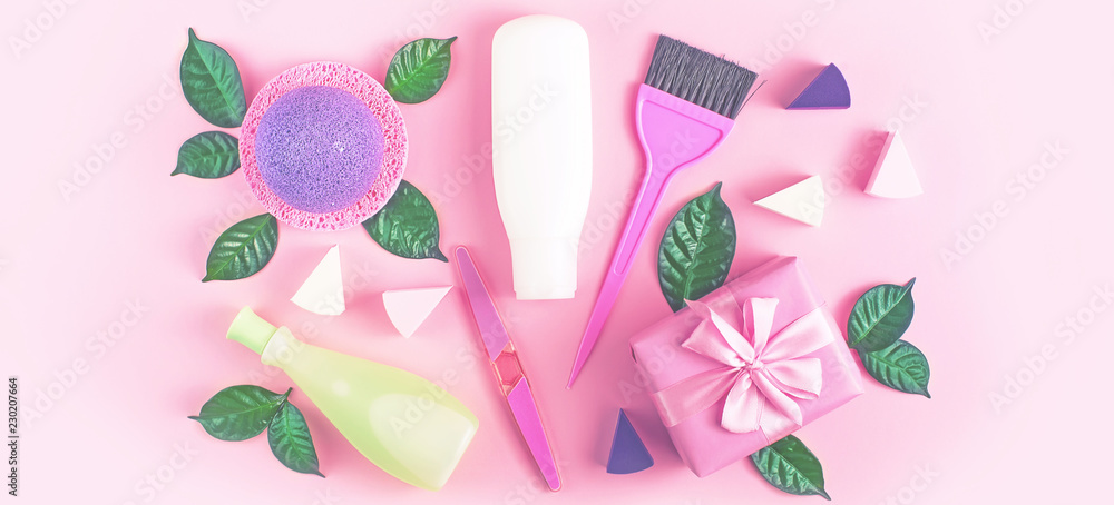 Banner Cosmetic packaging plastic bottle shampoo cream shower gel milk green leaves sponge box gift bow Natural organic product skin and hair care shopping Top view pink flat lay background.
