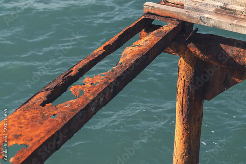 disassembled rusty metal pier. old metal supports. Black Sea