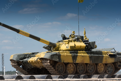 Army tank. Military training. Summer military exercises.