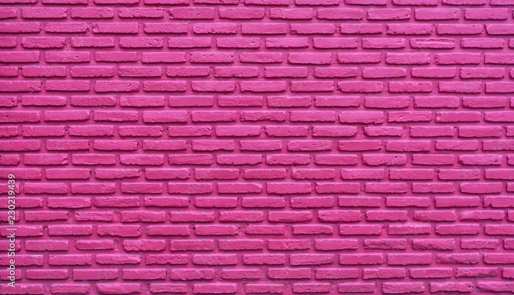 Pink brick wall abstract background. Pink rough brick wall texture