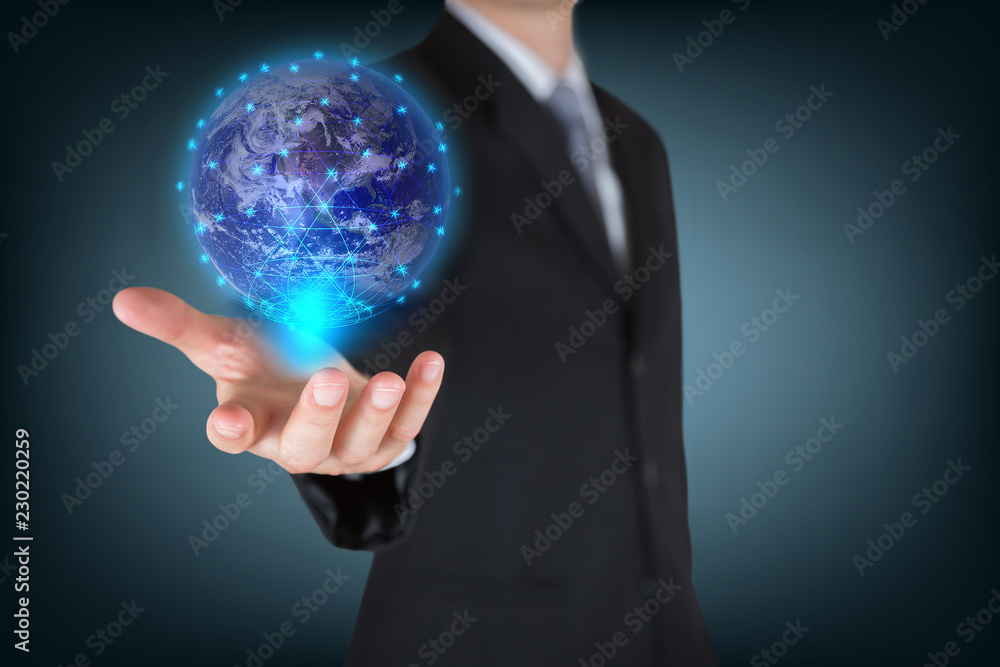 Businessman holding the glowing hologram digital globe as business, innovation, intelligent, idea and globalization concept. Elements of this image furnished by NASA Businessman holding the glowing hologram digital globe as business, innovation, intelligent, idea and globalization concept. Elements of this image furnished by NASA