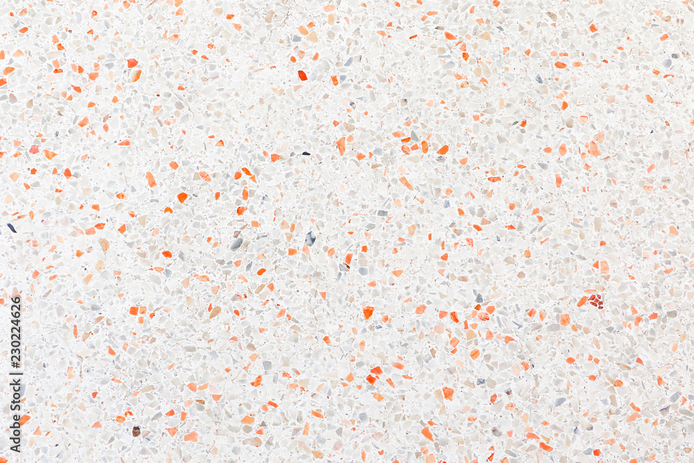Fototapeta premium podłogi z lastryko z pomarańczową skałą Małe lub marmurowe stare. polerowane kamienne ściany piękne tekstury na tle z miejsca na kopię dodać tekst
