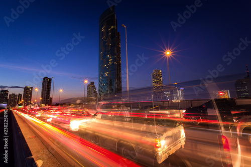 The light trails on the street and urban in the night or dusk as city life background. © ImagineDesign
