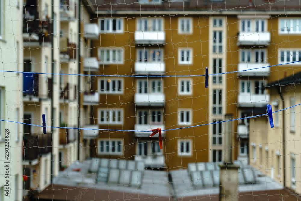 Inner courtyard balcony view over an empty clothesline