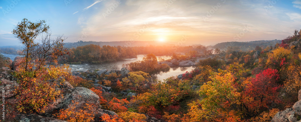 amazing panoramic  view of  blue foggy river and colorful forest on sunrise. autumn landscape - obrazy, fototapety, plakaty 
