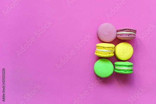 Macaroon on a colored background top view, copyspace