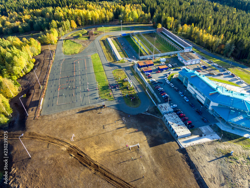 Sports complex for training biathletes and skiers in warm day photo