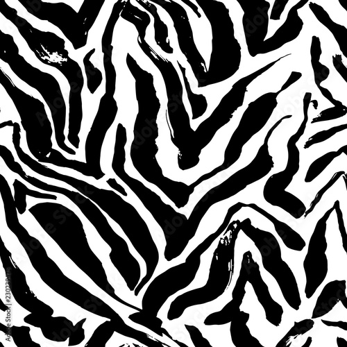 Brush painted zebra seamless pattern. Black and white stripes grunge background.