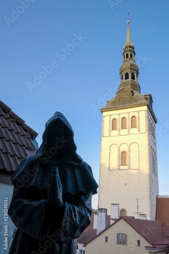 praying monk  near St. Nicholas Church (Niguliste kirik) in old town Tallinn