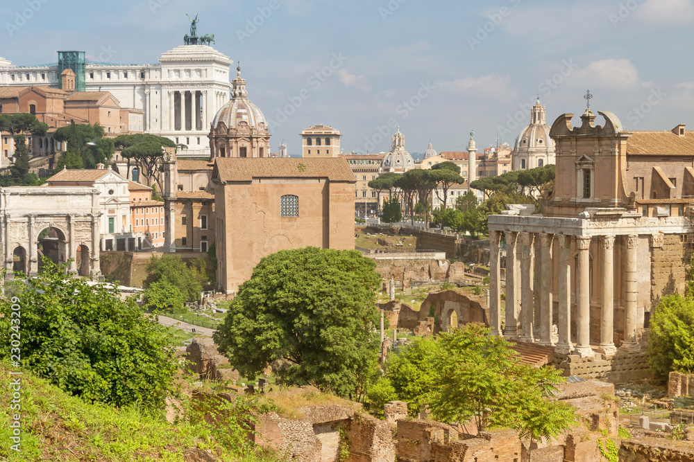 General view of empty Forum Romanum in Rome on a sunny summer day. All potential trademarks are removed. 
