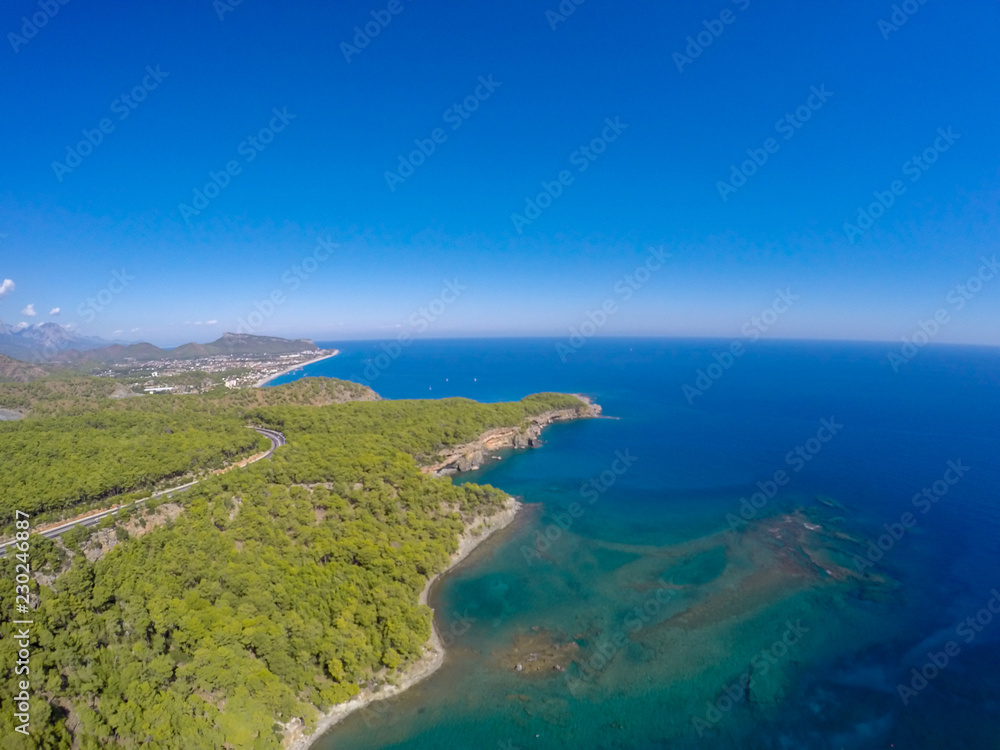 aerial view on beach and coast of sea, turquoise water, top view. Phaselis beach in Antalya, Turkey  