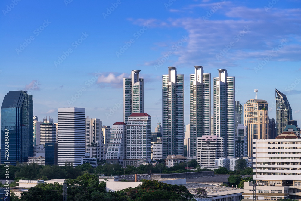 cityscape of Bangkok city skyline with blue sky background, Bangkok city is modern metropolis of Thailand and favorite of tourists