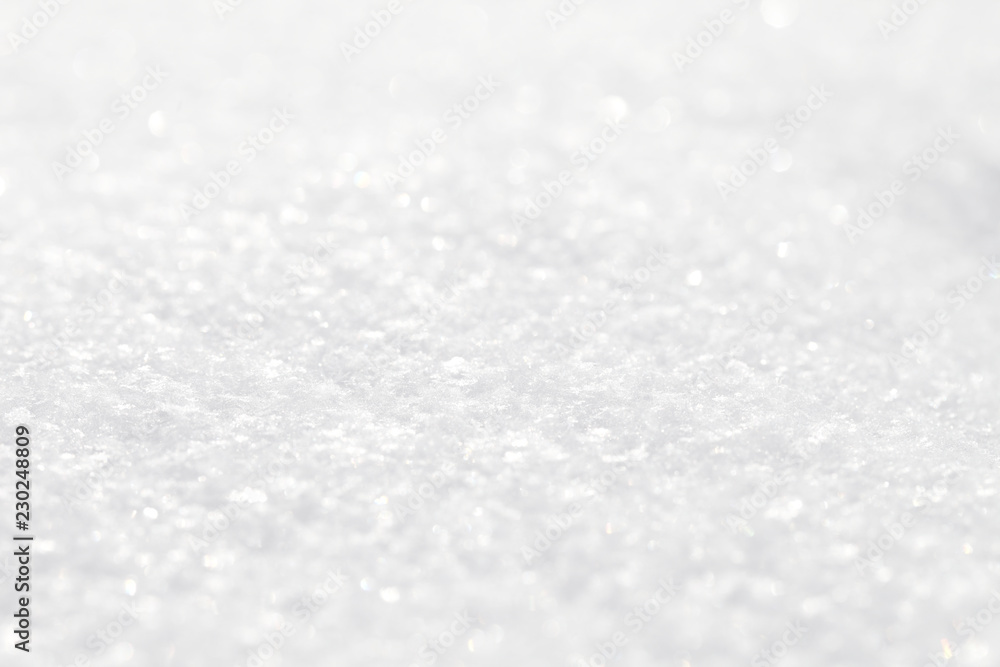 The background is white. The texture of the brilliant snow for the New Year's postcard. The background is white. The texture of the brilliant snow for the New Year's postcard.