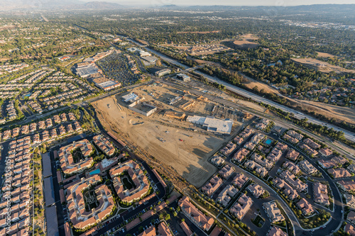 Aerial view of new homes, shopping center construction, Rinaldi Street and the 118 freeway in the Porter Ranch community of Los Angeles, California.   photo