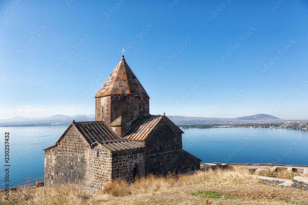 Scenic view of an old Sevanavank church in Sevan, on sunny day . Armenia Scenic view of an old Sevanavank church in Sevan, on sunny day . Armenia