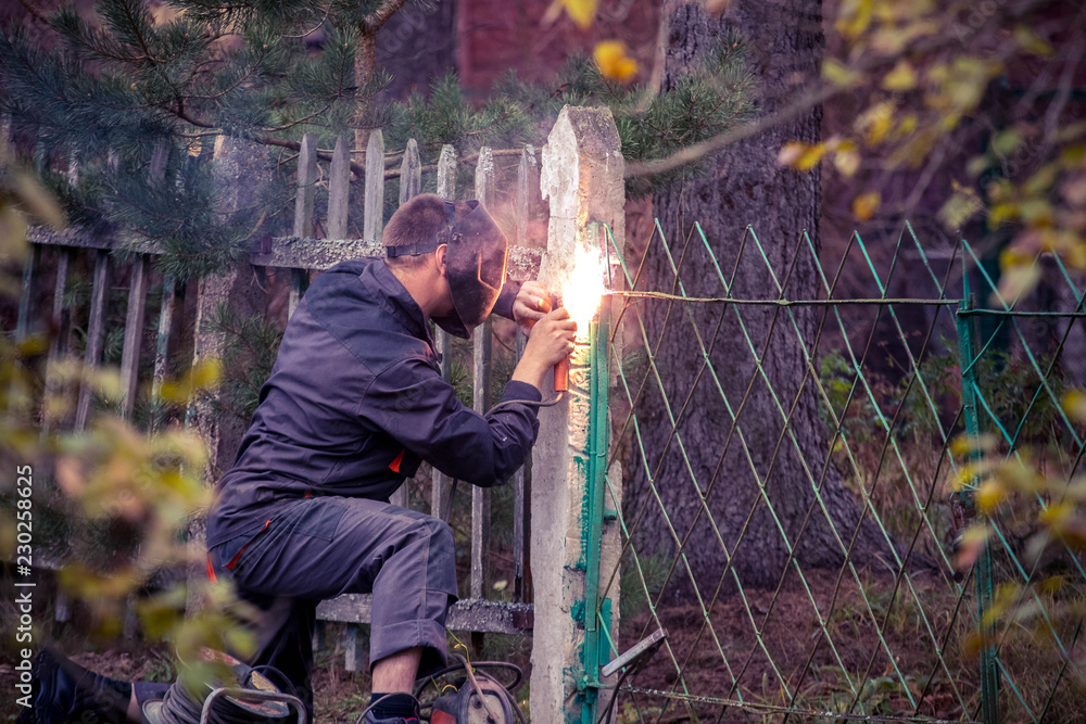 welder at work weld the gate welder at work weld the gate