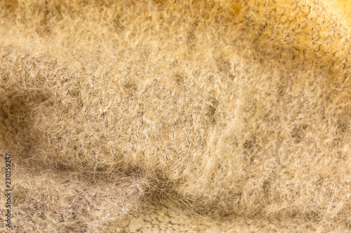 background of knitted shawl in brown mohair and silk wool