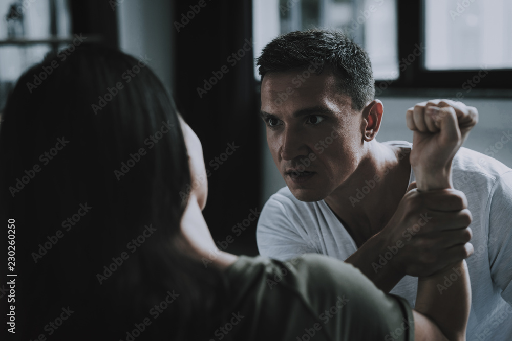 Man Holds Hand Fights and Abuse Woman at Home Man Holds Hand Fights and Abuse Woman at Home