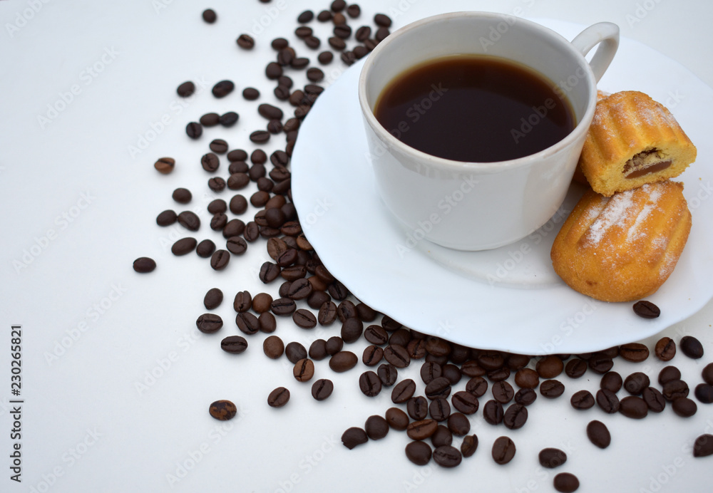 Fototapeta premium Coffee in a Cup with pastries on a white background.