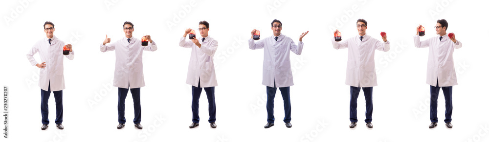 Doctor in blood donation concept isolated on white Doctor in blood donation concept isolated on white