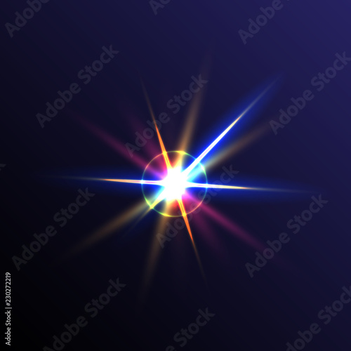bright multicolored flash of light from the spotlight. isolated on dark background