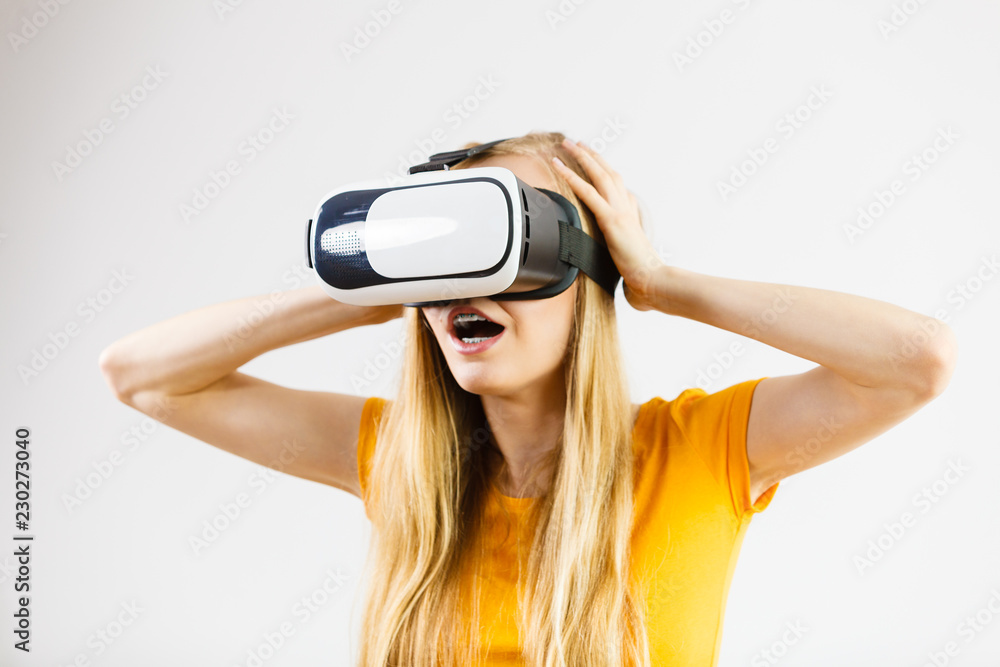 Girl wearing virtual reality goggles. Girl wearing virtual reality goggles.