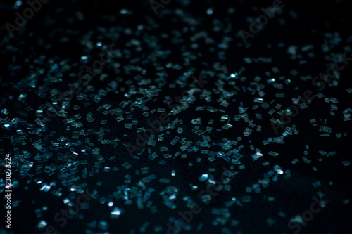 Shards of glass on the black background