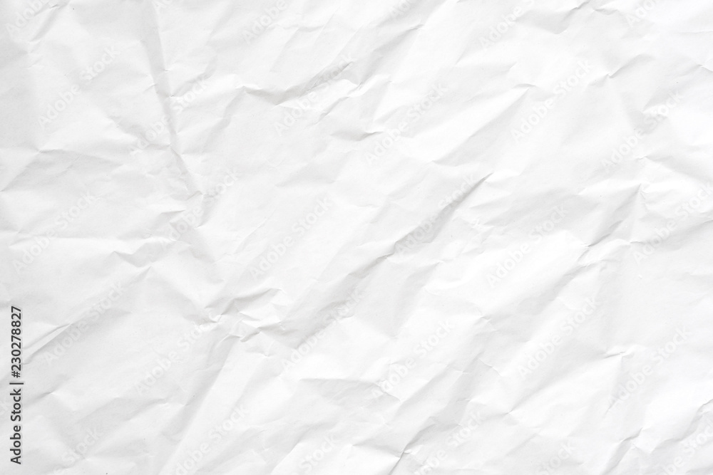 Obraz premium White crumpled paper texture background.