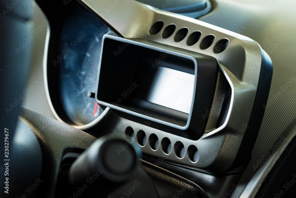 Modern car dashboard or control panel close Modern car dashboard or control panel close