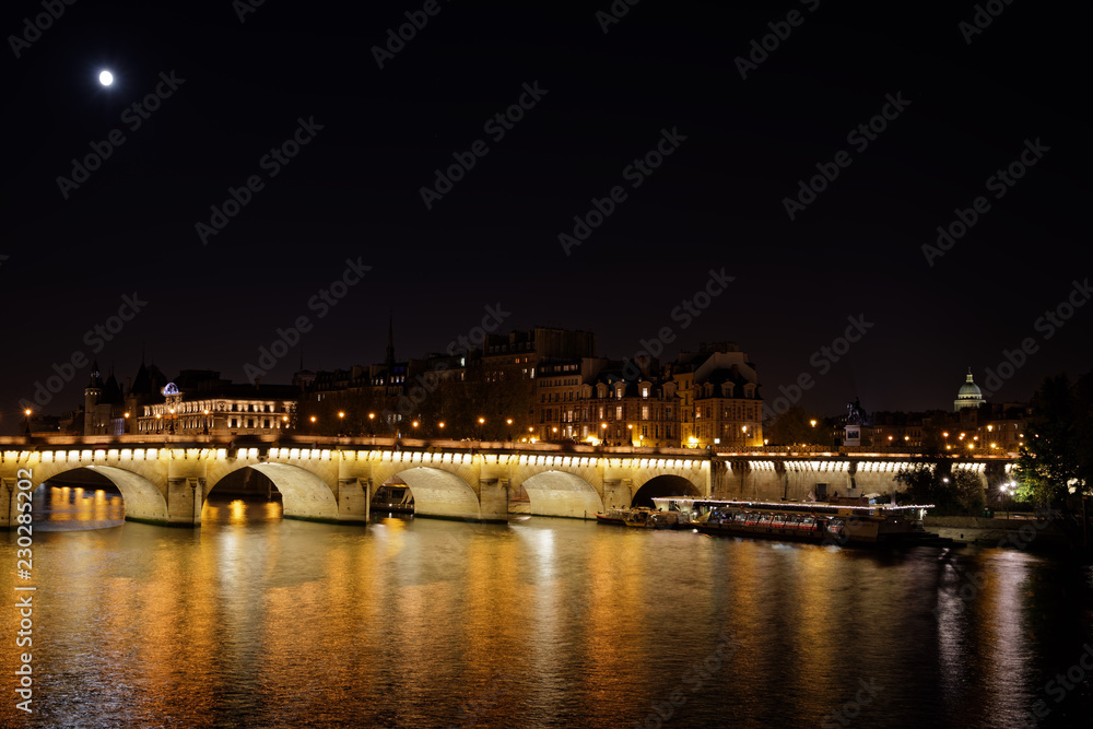 Paris, France - October 21, 2018: Pont neuf bridge by night in Paris